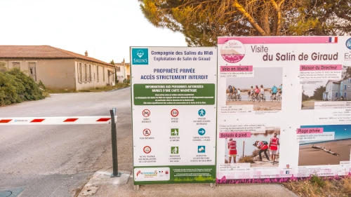 French signs at the pink salt lakes at Salin de Giraud in the South of France