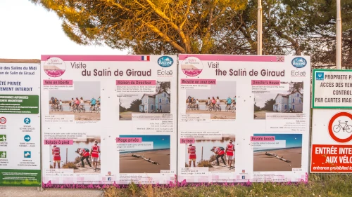 French signs at the pink salt lakes at Salin de Giraud in the South of France