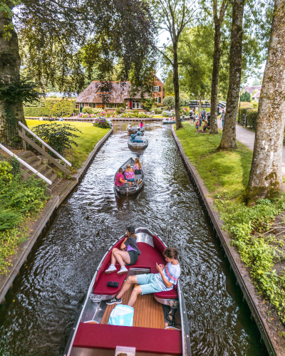 Busy canal in Giethoorn, the Netherlands