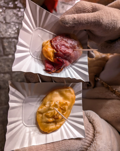 Oscypek grilled cheese on the Christmas Market in Kraków, Poland