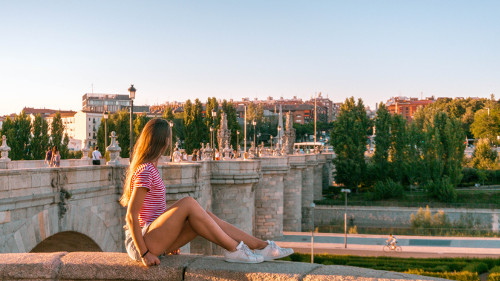 Sunset at the Bridge of Toledo in Madrid Rio Park, Spain