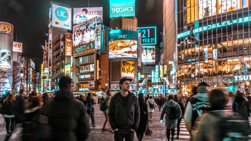 Shibuya crossing at night in Tokyo, Japan